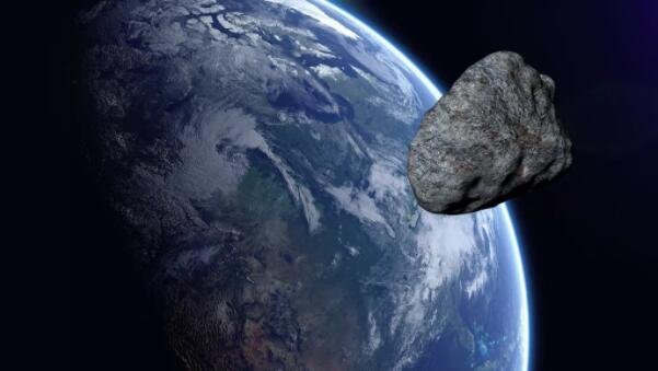 艺术家描绘的小行星在地球附近经过.jpg